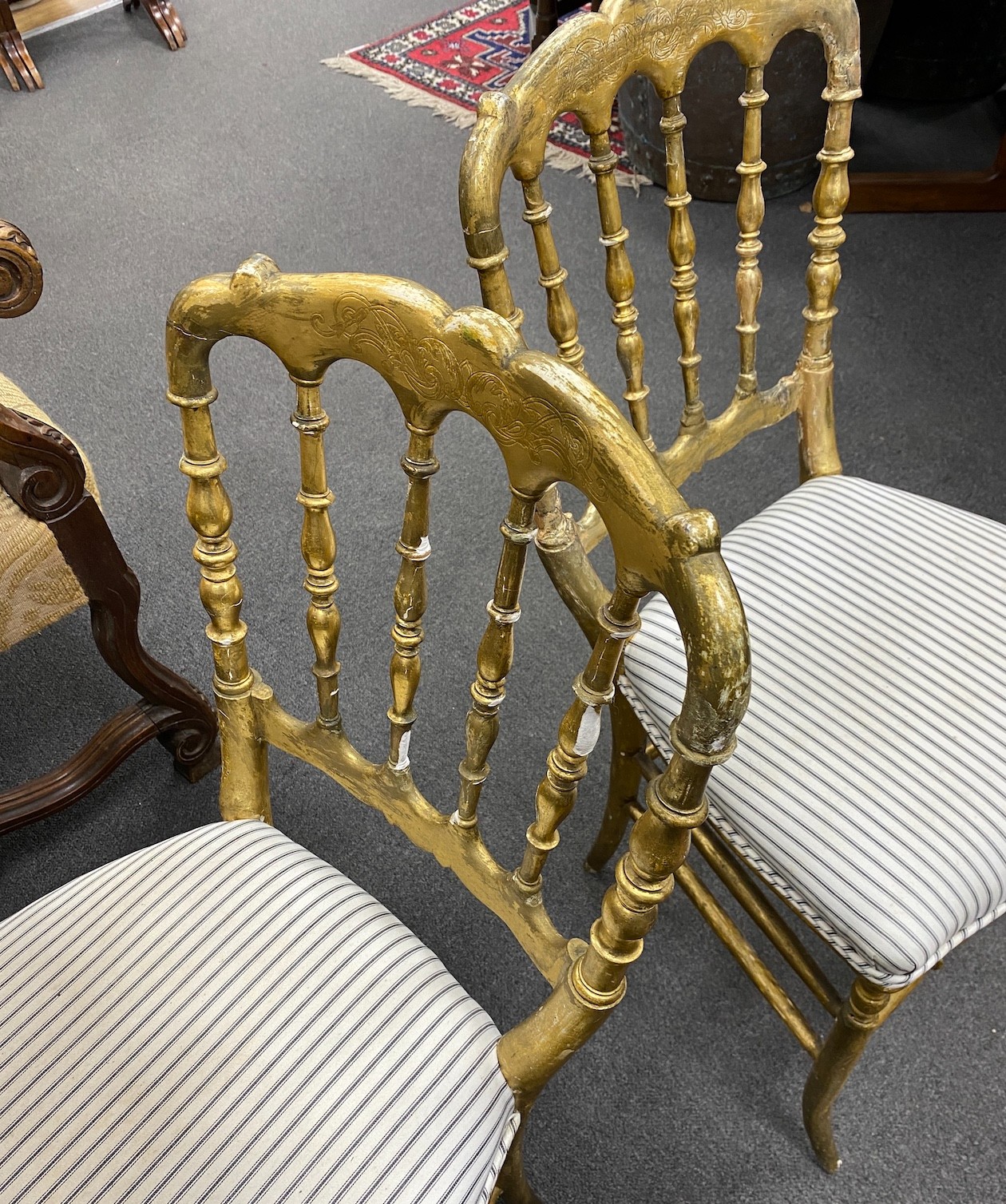 A set of four giltwood chairs